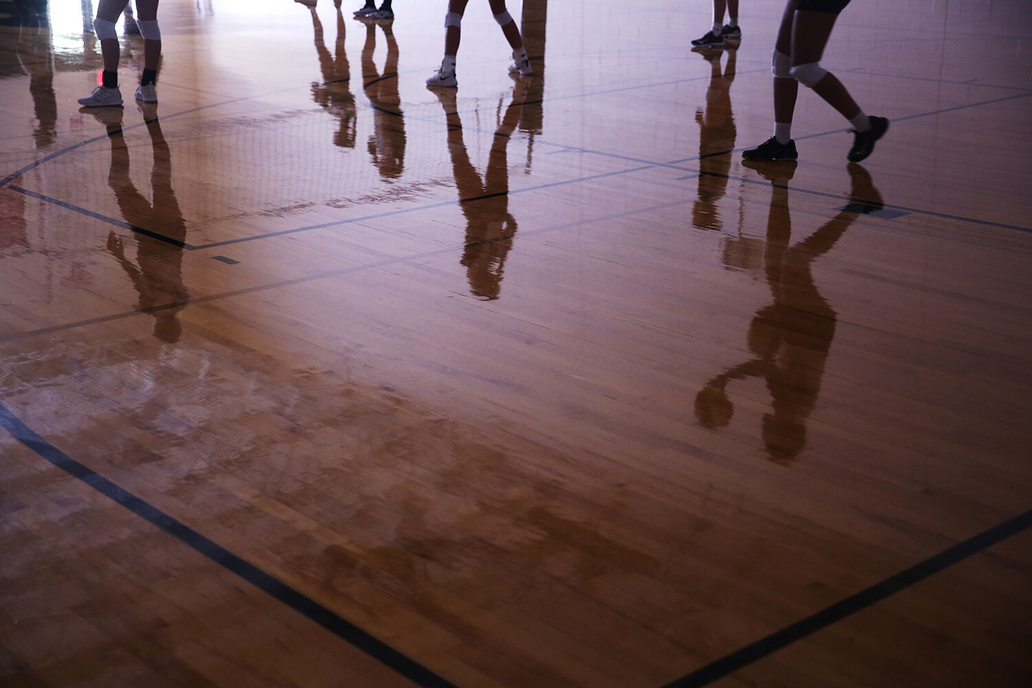 The Lady Bison spent part of their warm up in the small gym